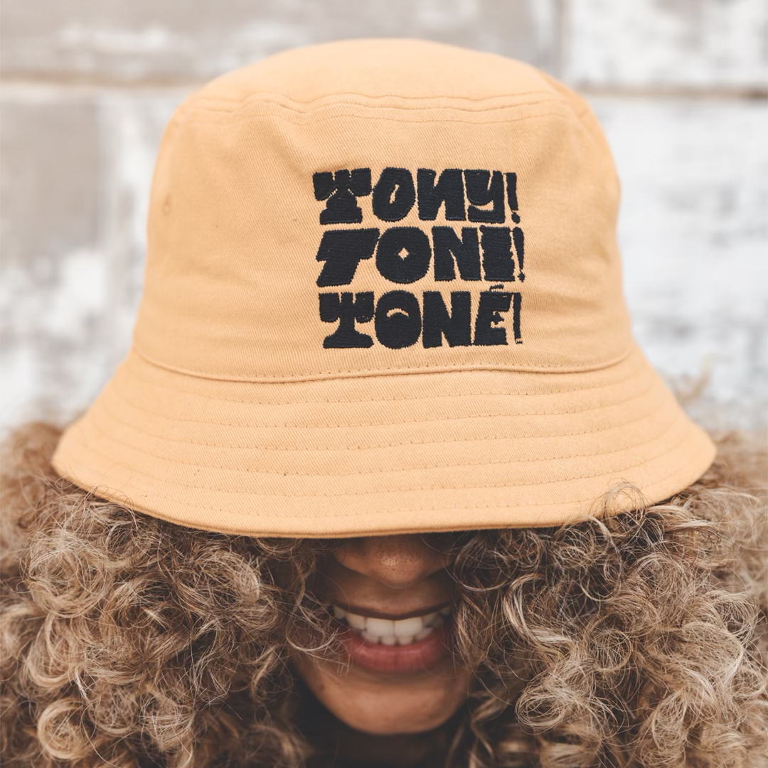 Tony! Toni! Toné! "Stacked Logo" Bucket Hat in Gold